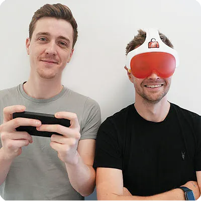 Two humans, one controller and the other human wearing the headset.